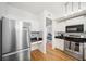 Spacious kitchen with stainless-steel refrigerator and a breakfast nook area at 501 Knights Run Ave # 5101, Tampa, FL 33602