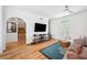 Open-concept living room with hardwood floors and bright, airy windows at 501 Knights Run Ave # 5101, Tampa, FL 33602