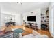Open-concept living space with hardwood floors, dining area, modern furnishings, and stylish decor at 501 Knights Run Ave # 5101, Tampa, FL 33602