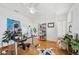 Bright office featuring hardwood floors, a ceiling fan, and a comfortable seating area at 501 Knights Run Ave # 5101, Tampa, FL 33602