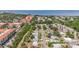 An aerial view capturing the neighborhood and the buildings with red roofs near the bay at 6556 S West Shore Cir, Tampa, FL 33616