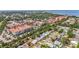 Wide aerial view of the community featuring single Gathering homes and a building complex nearby at 6556 S West Shore Cir, Tampa, FL 33616