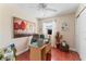Office/bedroom features an area rug, a window, and neutral paint at 6556 S West Shore Cir, Tampa, FL 33616