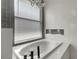 Luxurious soaking tub with natural light from a window at 719 Straw Lake Dr, Brandon, FL 33510