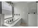Luxurious soaking tub with chandelier at 719 Straw Lake Dr, Brandon, FL 33510