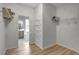 Spacious walk in closet leading to en-suite bath with floating shelves at 719 Straw Lake Dr, Brandon, FL 33510