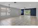 Spacious open living room ready for furnishings and featuring large sliding glass doors at 719 Straw Lake Dr, Brandon, FL 33510