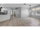 Empty Living Room with tile floor and large windows at 719 Straw Lake Dr, Brandon, FL 33510