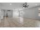 Open floor plan with tile flooring and abundant natural light at 719 Straw Lake Dr, Brandon, FL 33510