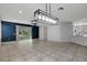 Open-concept floor plan with tile flooring and natural light at 719 Straw Lake Dr, Brandon, FL 33510