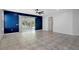 Spacious and bright living area with tile flooring and access to the backyard at 719 Straw Lake Dr, Brandon, FL 33510