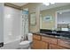 Well-lit bathroom with a combination shower and tub, complemented by a modern vanity at 7657 Caponata Blvd, Seminole, FL 33777