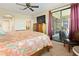Bedroom featuring a sliding glass door leading to the outside with large dresser at 7657 Caponata Blvd, Seminole, FL 33777