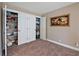 Walk-in closet with ample storage space and custom shelving, providing organization for all your belongings at 7657 Caponata Blvd, Seminole, FL 33777