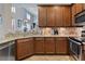Well-equipped kitchen with granite countertops, stainless steel appliances, and plenty of cabinet space at 7657 Caponata Blvd, Seminole, FL 33777