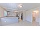 Modern kitchen with stainless steel appliances, granite countertops, and grey cabinets at 905 W Ball St, Plant City, FL 33563