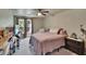 Comfortable bedroom with natural light and carpet flooring at 9724 Hermit Hollow Ln, Gibsonton, FL 33534