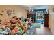 Eclectic bedroom with bright colors and a chandelier at 9724 Hermit Hollow Ln, Gibsonton, FL 33534