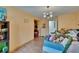 Eclectic bedroom with bright colors and a chandelier at 9724 Hermit Hollow Ln, Gibsonton, FL 33534