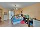 Eclectic bedroom with bright colors, stuffed animals and a wooden floor at 9724 Hermit Hollow Ln, Gibsonton, FL 33534