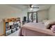 Bright bedroom with large windows offering abundant natural light at 9724 Hermit Hollow Ln, Gibsonton, FL 33534