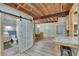 Open dining area offers wood-look floors, stone accents and a quaint breakfast bar at 9724 Hermit Hollow Ln, Gibsonton, FL 33534