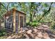 Outdoor shed surrounded by trees at 9724 Hermit Hollow Ln, Gibsonton, FL 33534