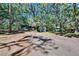 View of the house and surrounding outbuildings on the property at 9724 Hermit Hollow Ln, Gibsonton, FL 33534