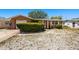 Lovely single-story home with an attached garage and easy-to-maintain gravel front yard at 1051 Normandy Blvd, Holiday, FL 34691