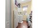 Efficient laundry room with washer, dryer, and ample storage at 10726 Miracle Ln, New Port Richey, FL 34654