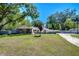 Beautiful single-Gathering home with stone accents and a well-manicured front lawn at 1120 Country Ln, Lutz, FL 33558