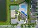Overhead view of community amenities: pool, tennis, basketball courts, clubhouse, playgrounds, parking and more at 12123 Ledbury Commons Dr, Gibsonton, FL 33534