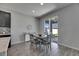 Bright dining area with a sliding glass door to the backyard patio at 12123 Ledbury Commons Dr, Gibsonton, FL 33534