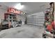 Spacious two car garage with overhead storage and room for tools and equipment at 12123 Ledbury Commons Dr, Gibsonton, FL 33534
