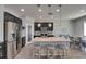 Bright kitchen with stainless steel appliances, granite countertops, and ample cabinet space at 12123 Ledbury Commons Dr, Gibsonton, FL 33534