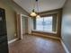 Bright dining area featuring tile floors, a window seat, and pantry, perfect for Gathering meals at 13400 Old Florida Cir, Hudson, FL 34669