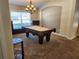Entertain in style in this game room featuring a pool table and custom window bench at 13400 Old Florida Cir, Hudson, FL 34669