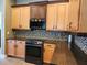 The kitchen has stainless steel appliances and a custom backsplash at 13400 Old Florida Cir, Hudson, FL 34669