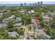 Beautiful neighborhood with a charming home, mature trees, and the bay in the background at 1603 S Arrawana Ave, Tampa, FL 33629