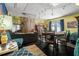 Cozy bonus room with stylish furniture, ambient lighting, and access to the outdoors at 1603 S Arrawana Ave, Tampa, FL 33629