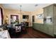 Dining area with a chandelier, seamlessly connected to the kitchen, offering a cozy and inviting atmosphere at 1603 S Arrawana Ave, Tampa, FL 33629