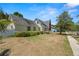 Charming home with green shutters and a well-manicured front yard at 1603 S Arrawana Ave, Tampa, FL 33629
