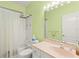 Bright bathroom features a shower-tub combination and light color countertops at 187 Sage Cir, Crystal Beach, FL 34681