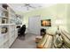 Cozy bedroom features a futon, workspace and closet at 187 Sage Cir, Crystal Beach, FL 34681