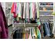 Walk-in closet with extensive built-in shelving and hanging racks at 187 Sage Cir, Crystal Beach, FL 34681