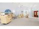 Spacious living room with vaulted ceiling and plush seating offers a comfortable and inviting atmosphere at 187 Sage Cir, Crystal Beach, FL 34681