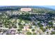 Stunning aerial perspective of a serene neighborhood, with Clearwater Beach in view, surrounded by lush greenery and inviting homes at 1985 Hastings Dr, Clearwater, FL 33763