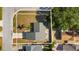 Aerial view of the property showing the roof, driveway, landscaping, and surrounding neighborhood at 1985 Hastings Dr, Clearwater, FL 33763