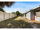 Backyard featuring a nice concrete patio and privacy fence at 1985 Hastings Dr, Clearwater, FL 33763