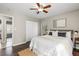 Charming bedroom with hardwood floors, a closet, and a serene ambiance at 1985 Hastings Dr, Clearwater, FL 33763